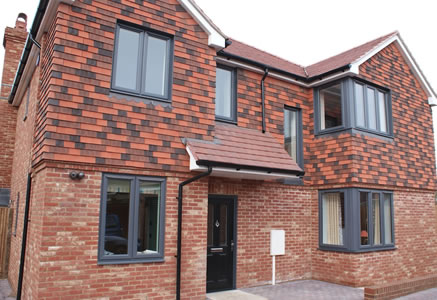 House with Grey uPVC Windows
